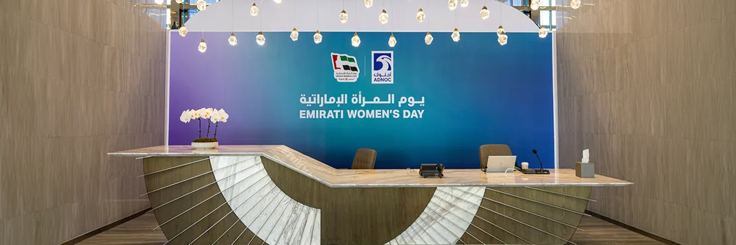 A fourth consecutive ADNOC celebration connecting two locations through stage design, participatory workshops, interactive photography and coordinated show production.