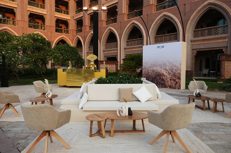 Evolution Events outdoor hospitality area combining contemporary furniture with Emirati design details
