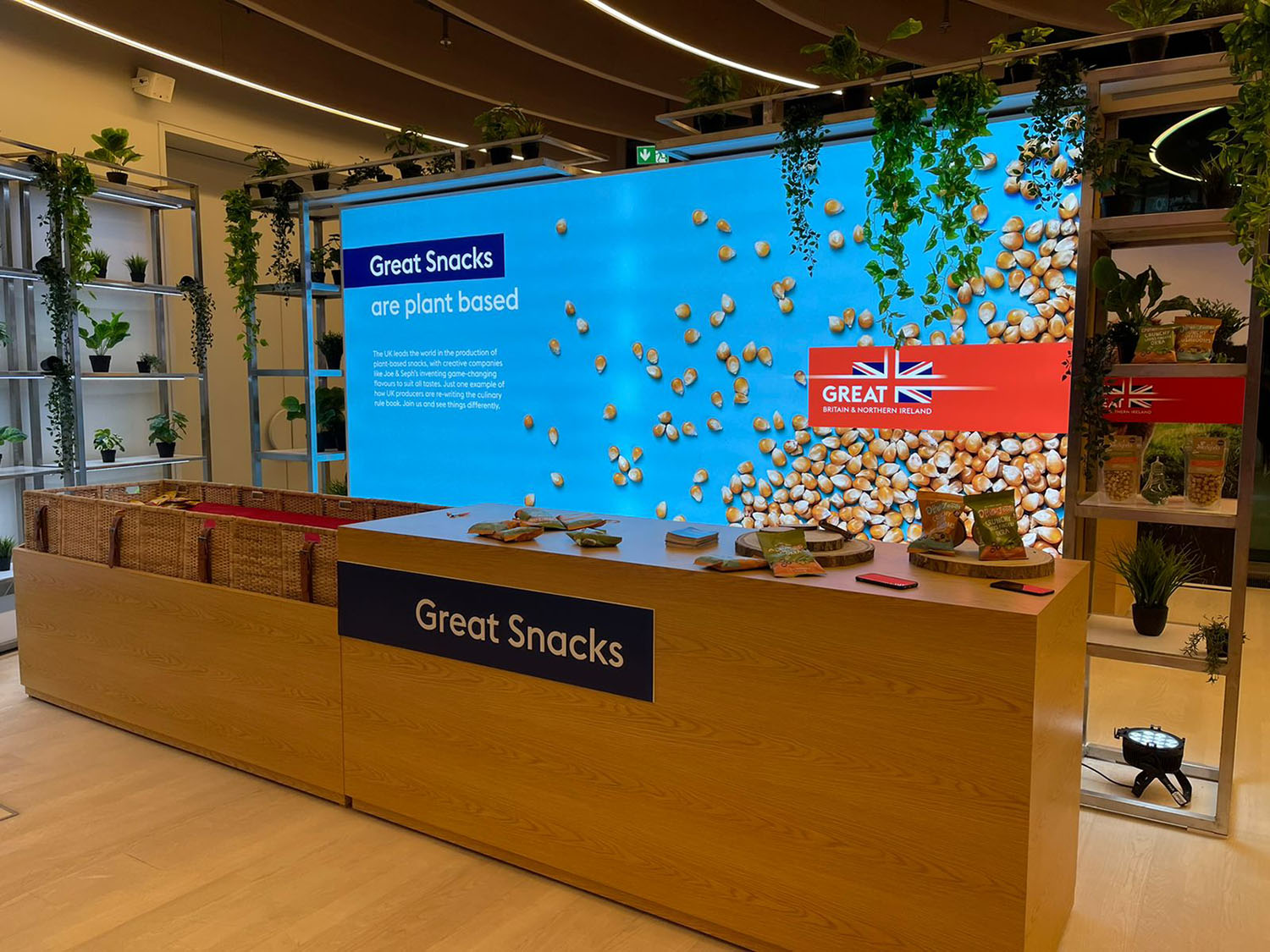 Great Snacks tasting area combining British produce, digital graphics and natural timber finishes