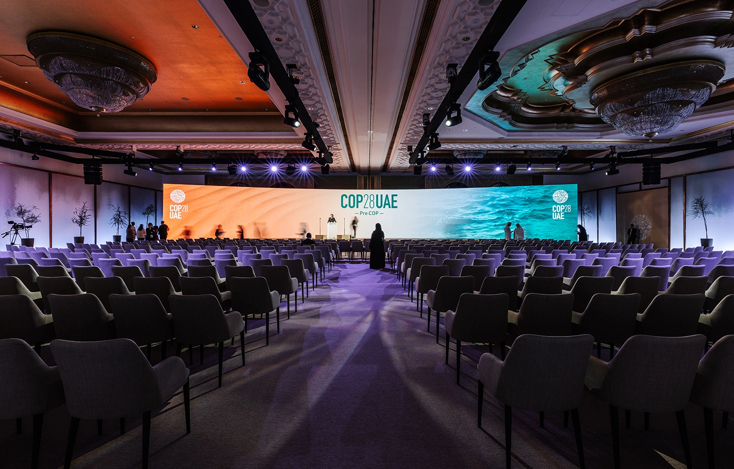 A high-level climate meeting at Emirates Palace shaped through formal conference production, locally rooted hospitality and a culturally enriched opening sequence.