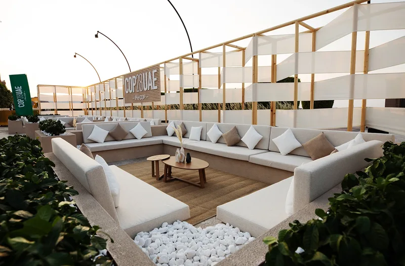 Pre-COP28 outdoor lounge overlooking the Abu Dhabi waterfront beside the conference venue