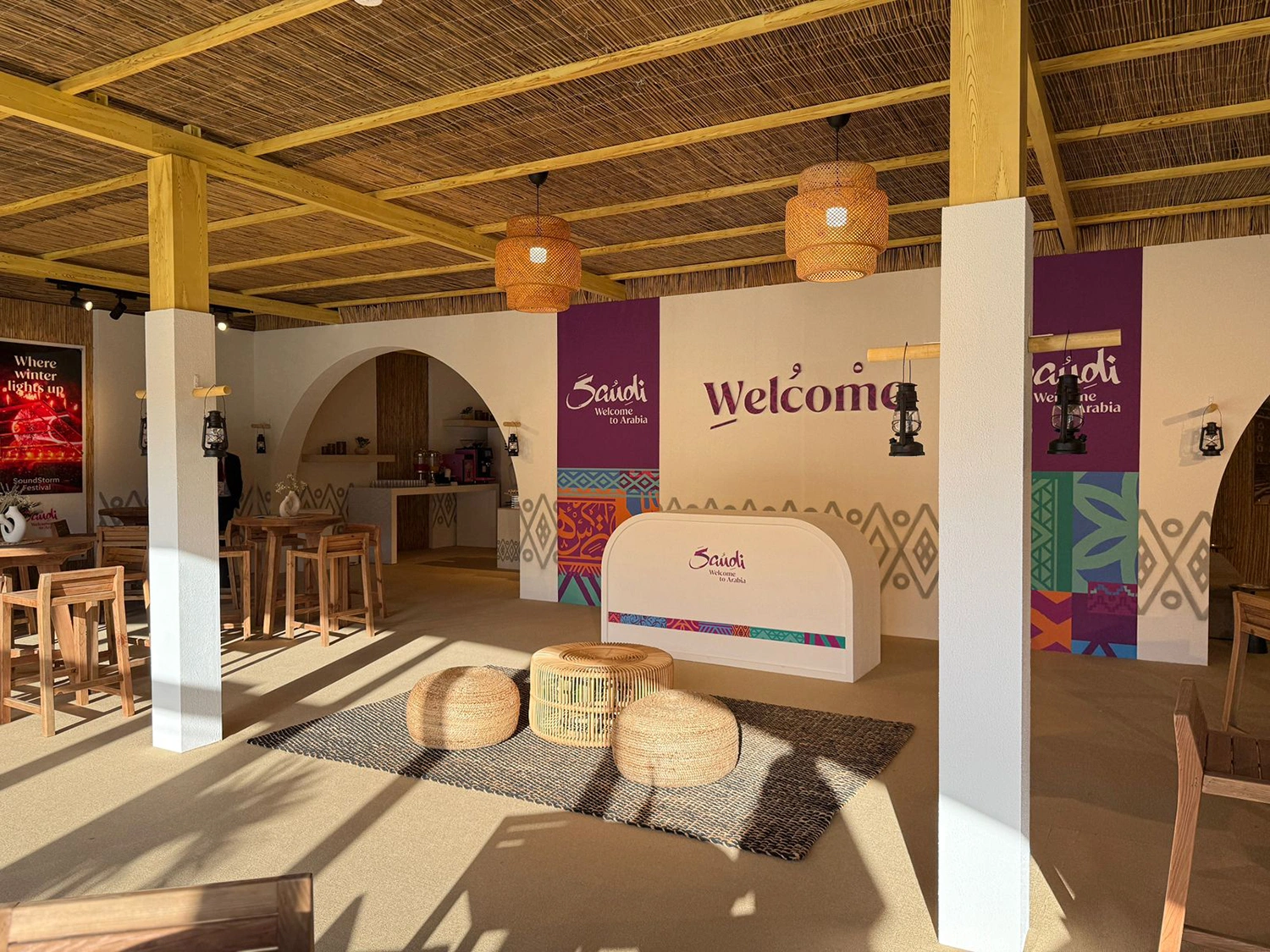 A temporary VIP tent transformed into a refined Visit Saudi hospitality environment, supported by a coordinated welcome presence at Emirates Dubai 7s.