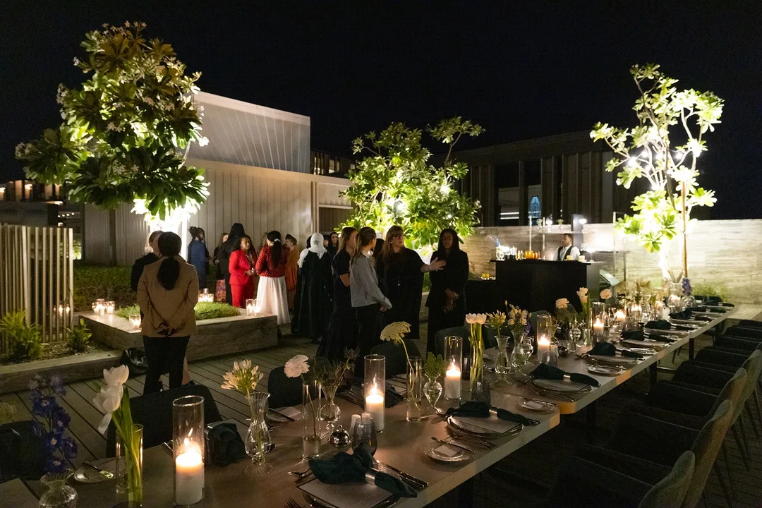 Female corporate executives and leaders attending formal networking banquet in Dubai