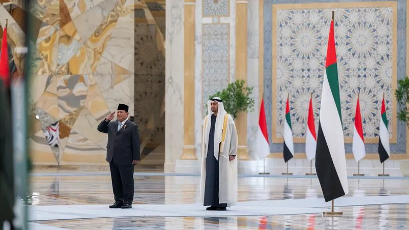 Official state bilateral reception hall featuring custom timber staging and national flag displays